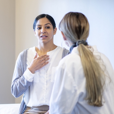 A woman talking to her doctor.
